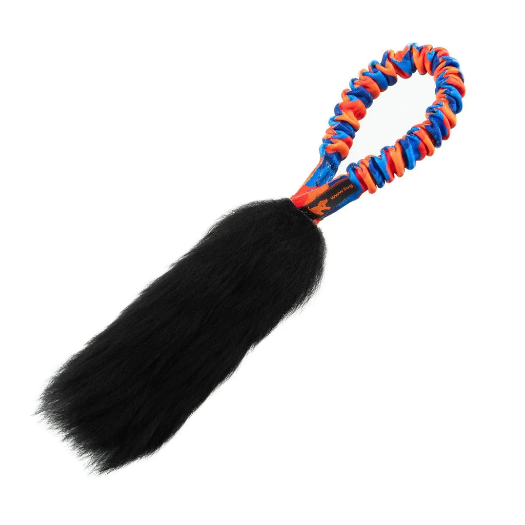 Orange‑handled Pocket Magnet Sheepskin Dog Toy with a fluffy, naturally scented sheepskin bite zone and a stretchy bungee handle for distraction‑busting recall rewards