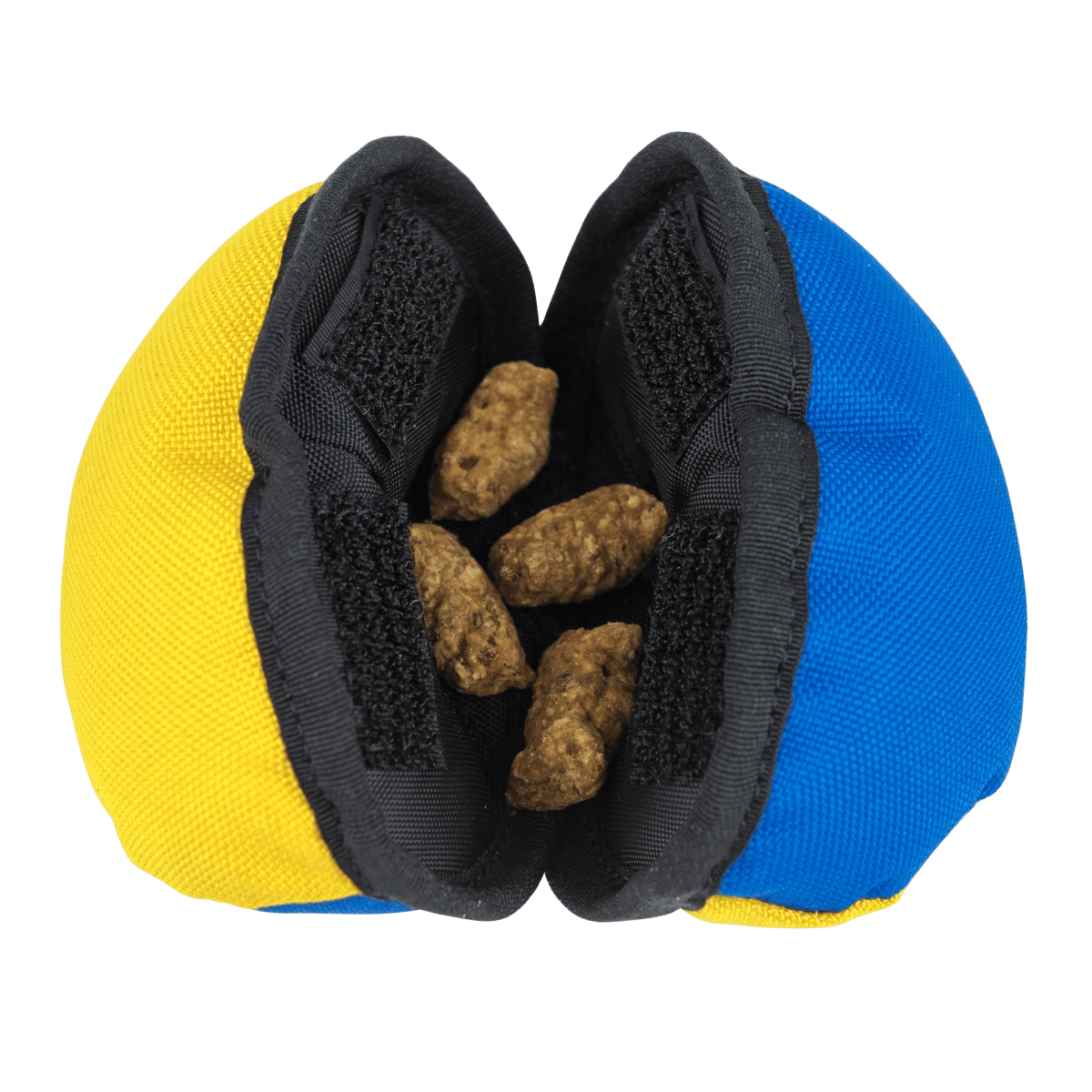 Yellow and blue clam toy opened to reveal kibble inside, designed for dogs to pry open.